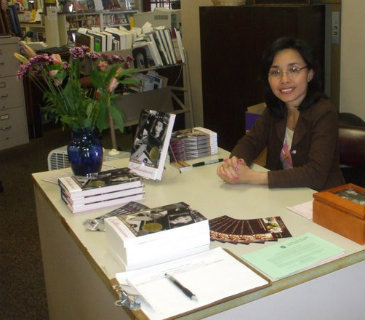 author signing a book